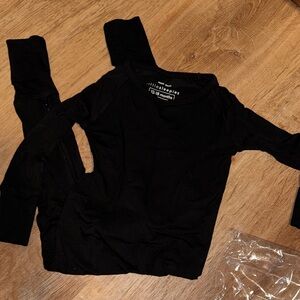 Little Sleepies Solid Black crescent zippy